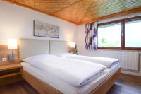 A bed or beds in a room at Lammerauhof