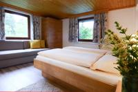 A bed or beds in a room at Lammerauhof