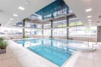 Bazén v ubytovaní Resort Apartamenty Klifowa Rewal 32 alebo v jeho blízkosti