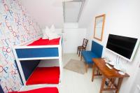 Łóżko lub łóżka w pokoju w obiekcie Boutique Hotel Szárcsa