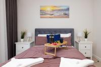 Posteľ alebo postele v izbe v ubytovaní Klifowa Premium Resort with SPA, Fitness & Kids Club by Noclegi Renters