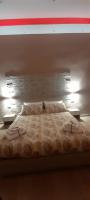 A bed or beds in a room at Vacanze Napoletane