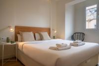 Posteľ alebo postele v izbe v ubytovaní Vibe Apartments by Olala Homes