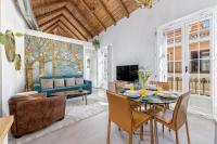 A television and/or entertainment centre at Mira Apartment in Malaga by Solaga Holiday Homes
