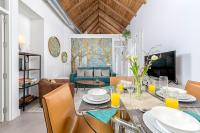 A seating area at Mira Apartment in Malaga by Solaga Holiday Homes