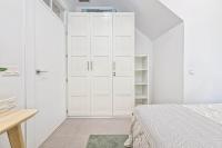 A bed or beds in a room at Mira Apartment in Malaga by Solaga Holiday Homes