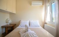 Postel nebo postele na pokoji v ubytování Zante Sunny Villa II