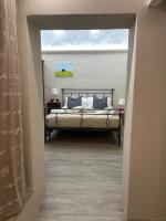 A bed or beds in a room at Pienzalettings