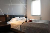 Łóżko lub łóżka w pokoju w obiekcie SKi&bike apartments