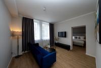 TV a/nebo společenská místnost v ubytování Emily Hotel Leipzig Neue Messe