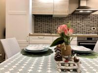 A kitchen or kitchenette at MIMI'S HOME casa per vacanze