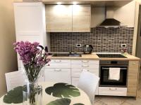 A kitchen or kitchenette at MIMI'S HOME casa per vacanze