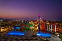 a view of a water park at night at Charmillion Gardens Aquapark in Sharm El Sheikh