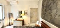 A bed or beds in a room at COMODO AL MARE