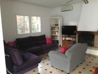 A television and/or entertainment centre at Roche Pinos Verdes