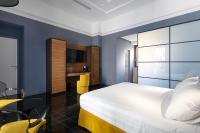 Posteľ alebo postele v izbe v ubytovaní Hotel Poerio 25 Boutique Stay