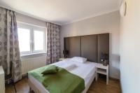 Posteľ alebo postele v izbe v ubytovaní Arion Airport Hotel