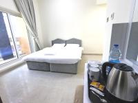 Barsha Star Residence - Home Stayにあるベッド