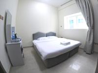 Barsha Star Residence - Home Stayにあるベッド