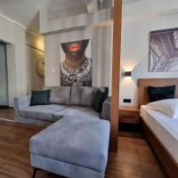 Posteľ alebo postele v izbe v ubytovaní RED ROOMS TSIMISKI 60