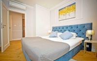 Posteľ alebo postele v izbe v ubytovaní Elegant Apartment Oldtown Marina