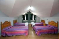 Posteľ alebo postele v izbe v ubytovaní Hostal Hispano