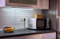 Kuchyň nebo kuchyňský kout v ubytování Apartment in Lopar with balcony, air conditioning, WiFi, washing machine (4885-1)