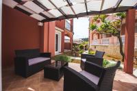 Posezení v ubytování Apartment in Lopar with balcony, air conditioning, WiFi, washing machine (4885-1)