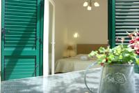 Posteľ alebo postele v izbe v ubytovaní Medulić Palace Rooms & Apartments