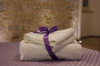 Posteľ alebo postele v izbe v ubytovaní Medulić Palace Rooms & Apartments