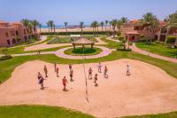 a group of people playing a game in a park at Charmillion Gardens Aquapark in Sharm El Sheikh