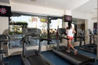 a woman running on treadmill in a gym at Charmillion Gardens Aquapark in Sharm El Sheikh