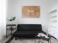 A seating area at Bacone Liberty Vittoria by Halldis