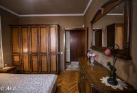 A bed or beds in a room at The Pearl Apartment Varna