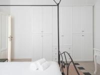 A bed or beds in a room at Bacone Liberty Vittoria by Halldis