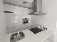 Kuchyň nebo kuchyňský kout v ubytování APARTAMENTO TERRAZAS DEL MAR, PISCINA PRIVADA