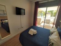 Postel nebo postele na pokoji v ubytování APARTAMENTO TERRAZAS DEL MAR, PISCINA PRIVADA