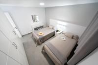 Posteľ alebo postele v izbe v ubytovaní Apartamentos Los Papagayos