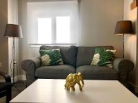 Posezení v ubytování GATU PREMIUM La Casa del Arco con wifi, aire acc, terraza ," Preferente mayores de 25 años y familias "