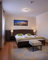 Posteľ alebo postele v izbe v ubytovaní Aparthotel Lumen