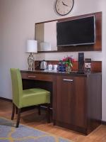 Televízia a/alebo spoločenská miestnosť v ubytovaní Aparthotel Lumen