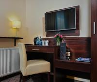Televízia a/alebo spoločenská miestnosť v ubytovaní Aparthotel Lumen