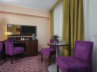 Televízia a/alebo spoločenská miestnosť v ubytovaní Aparthotel Lumen