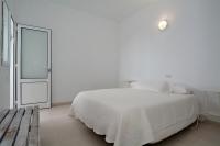 Posteľ alebo postele v izbe v ubytovaní Apartment Shanti Lara sea views Punta Mujeres by PVL