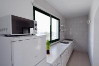 Kuchyňa alebo kuchynka v ubytovaní Apartment Shanti Lara sea views Punta Mujeres by PVL