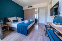 Postel nebo postele na pokoji v ubytování ARGENTO RESIDENCE