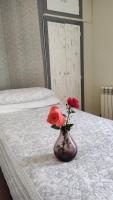 Postel nebo postele na pokoji v ubytování Hostal Romero