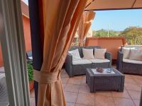 A seating area at casa vacanza Le 2 Isole