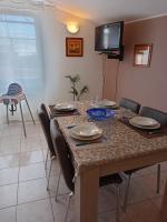 A television and/or entertainment centre at casa vacanza Le 2 Isole