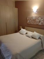 A bed or beds in a room at casa vacanza Le 2 Isole